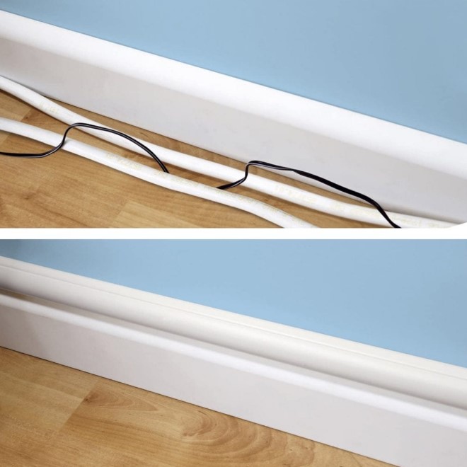 hide your TV wires inside a baseboard raceway   they usually have adhesive backing and are made of plastic, so you can cut them down to size