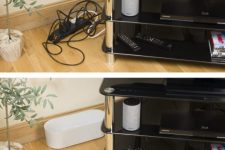 a cable management box is a nice and easy way to hide the cables without applying much effort to that