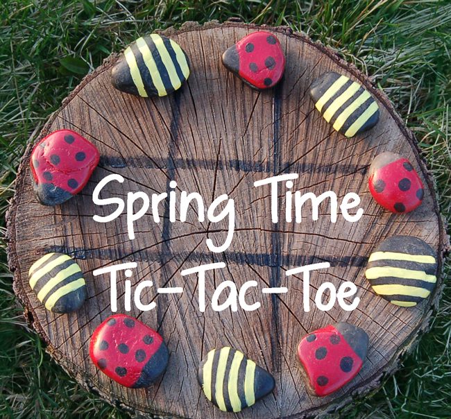 a lovely spring time tic tac toe made of a tree stump and rocks painted bright as bugs is a very lovely idea for your kids