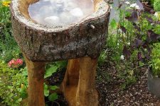 26 a stand with a bird bath made of an tree stump is a lovely idea for a rustic garden, you can make one easily