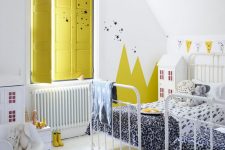 a lovely shared kids room design with yellow touches