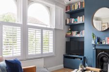 tier on tier shutters on double fronted windows here let the light inside but keep enough privacy, they can be folded back completely