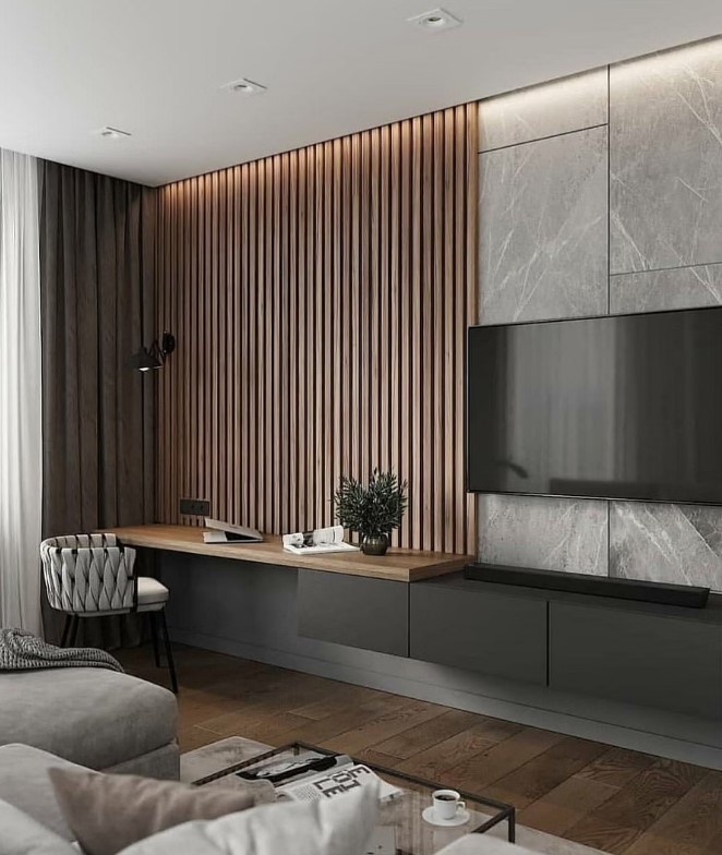 a contemporary monochromatic living room with a wood slat and stone tile accent wall, a floating TV unit with a built-in desk and neutral seating furniture