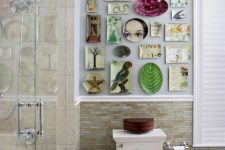 a modern bathroom with earthy tone tiles, a colorful gallery wall created of plates that brings fun and interest to the space