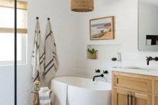a cozy modern country bathroom design with a wooden vanity