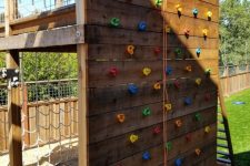 25 a backyard climbing wall including netting wall with a platform on top is a great idea to realize for your kids