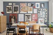 a gorgeous boho gallery wall in a dining space