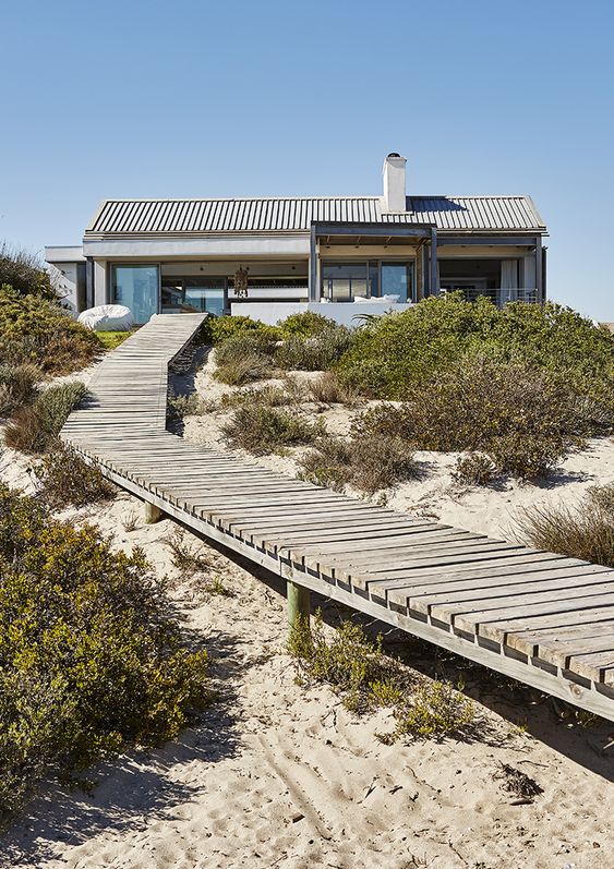 a raised whitewashed wooden walkway is a perfect idea for a beach outdoor space, whitewashed wood is a great match a raised whitewashed wooden walkway is a perfect idea for a beach outdoor space, whitewashed wood is a great match