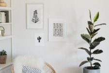 a small modern gallery wall with a free form and black and white botanical art is a lovely idea for a boho nook