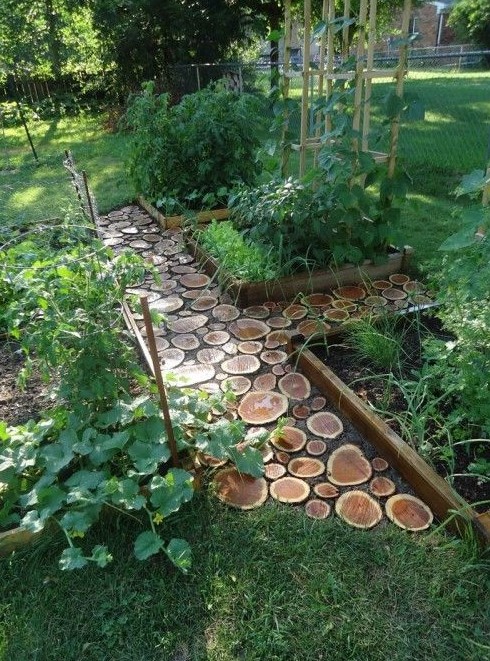 a small wood slice garden path plus a lawn looks very natural and eco friendly, and you can easily DIY such a walkway
