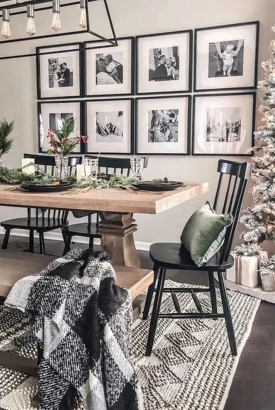 a stylish gallery wall with black frames, white matting and black and white family pictures for a traditional feel
