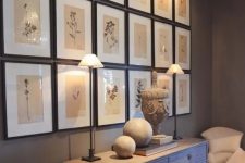 a stylish grid gallery wall with thin black frames, white matting and neutral botanical prints to add a bit of vintage to the space