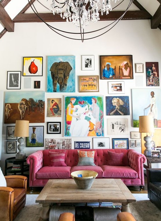 a super bright gallery wall with bold artworks with frames and without them, in bold colors and with a free form for a creative touch