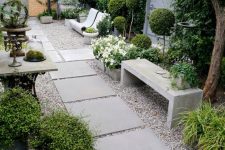 chic garden pathways with gravel and large paving stones make up a very successful combo