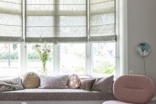 34 a cozy nook at the bow window, with semi sheer blinds and a windowsill daybed is a lovely solution for any space