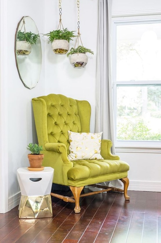 a bright modern nook with a vintage-inspired neon green chair that sets the tone in the space