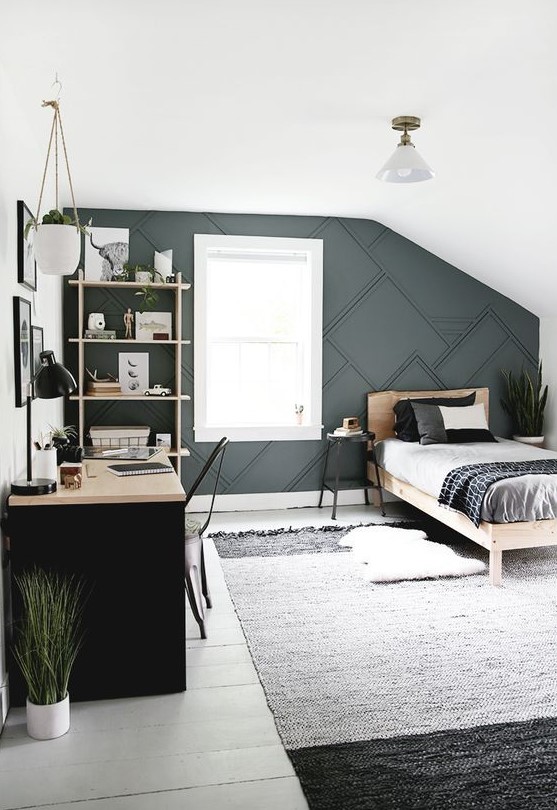 a chic farmhouse teen room with a grey paneled wall, a comfy desk and shelves by the wall, a comfy bed and printed textiles