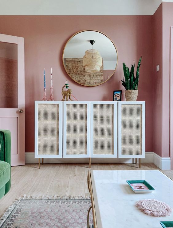 a lovely cabinet with cane webbing doors is a stylish idea for a mid-century modern space, it's lovely
