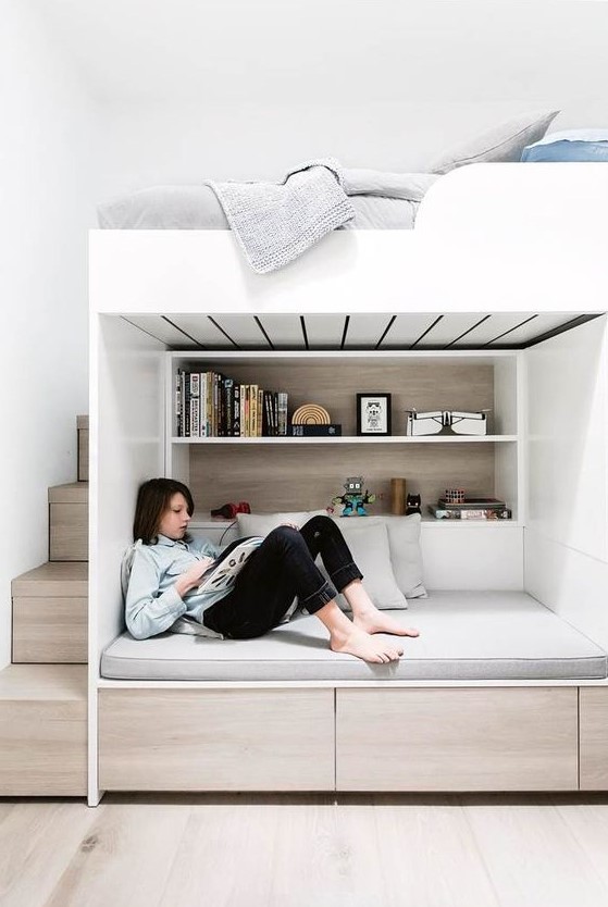 a minimalist teen room with a loft bedroom and a study and reading space down, with storage and built-in shelves is great