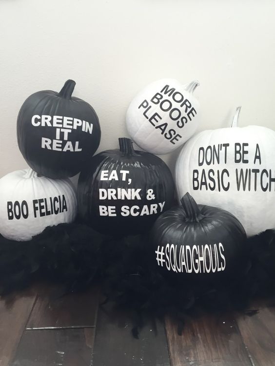 black and white pumpkins with black and white stenciling are amazing for stylish black and white Halloween decor