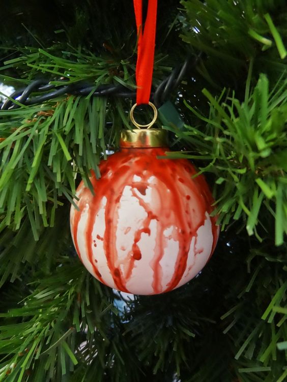 a bleeding Halloween ornament on red ribbon can be easily made for holidays, it looks cool and bold