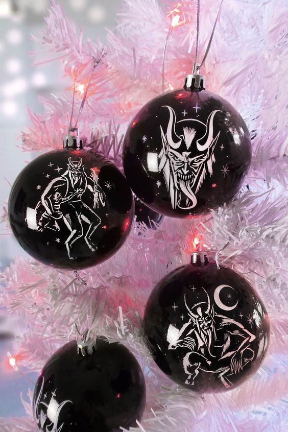 beautiful black ornaments with white images are amazing for Halloween decor, they never go out of style