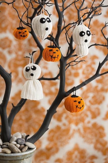a black Halloween tree decorated with cute and fun pumpkin and ghost crochet ornaments are adorable for styling your space, and you can DIY them all
