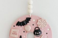 31 a lovely pink and black polymer clay Halloween ornament with bats, spiders, stars, hats and much more is the cutest