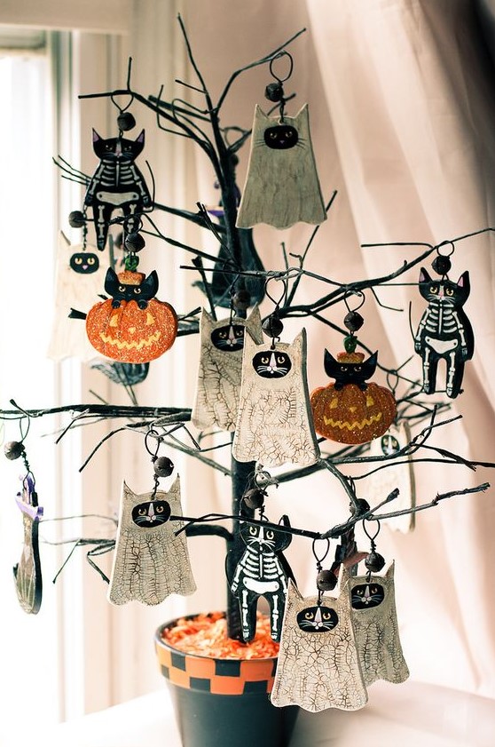catchy and bold Halloween ornaments with ghost cats, skeleton cats and pumpkins with black cats are gorgeous