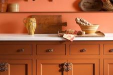 a lovely orange kitchen design
