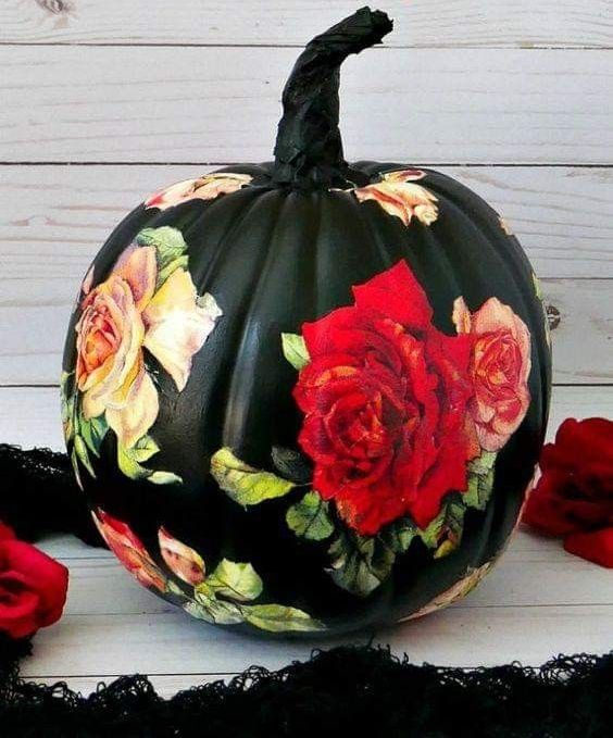 a black pumpkin with bold rose decoupage is a fantastic idea for Halloween, it will make a statement for sure