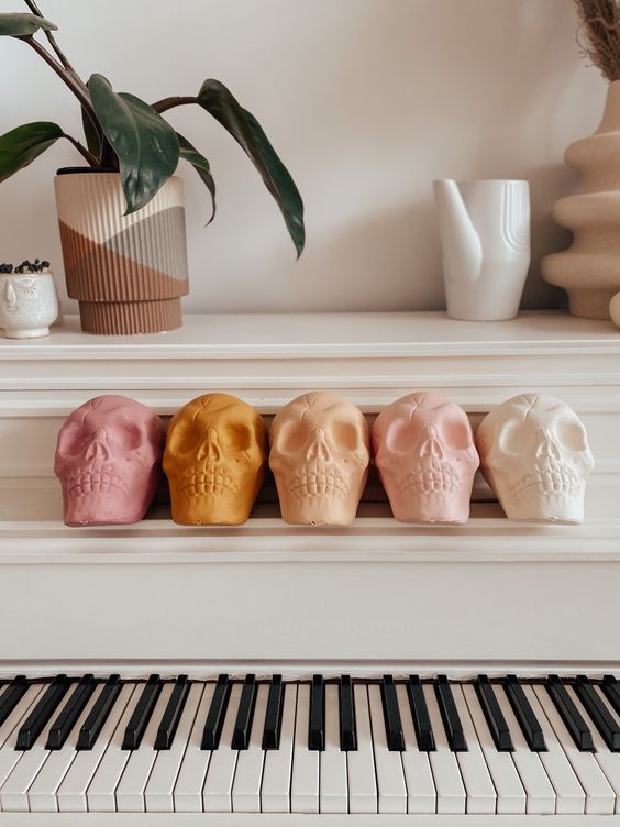 pastel-colored skulls will be a nice and cool decor idea for modern Halloween spaces and parties