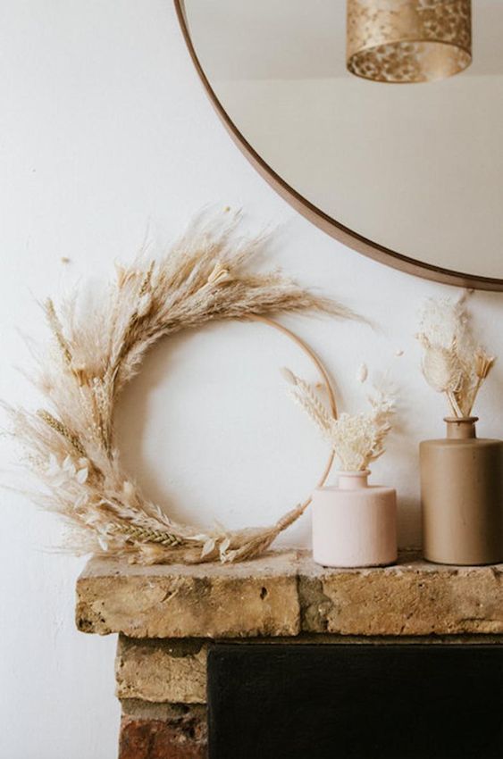 a pretty Thanksgiving wreath of an embroidery hoop, wheat and pampas grass, dried pieces plus matching arrangements