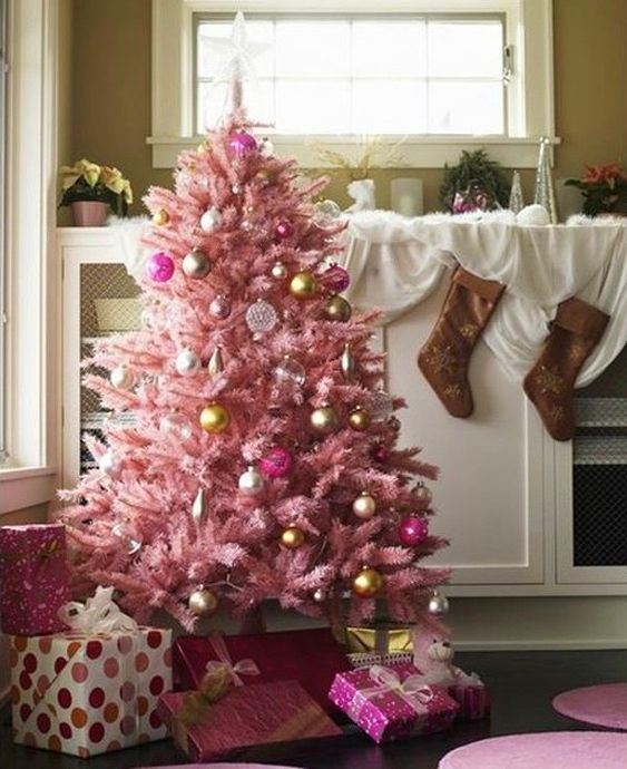 a pink Christmas tree decorated with white, gold and hot pink ornaments is a lovely idea for a delicate vintage space