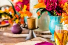 46 set a tablescape with orange, mustard, hot pink and purple hues to remember this Thanksgiving