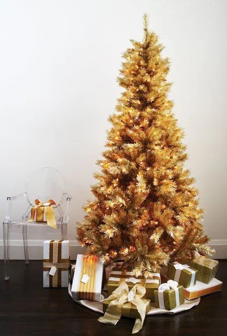 a gold pre-lit Christmas tree doesn't require any ornaments or decorations as it's bold itself
