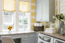 a bright laundry with an intergrated workspace and elevate casement window with French panes looks very chic