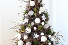 a cone-shaped Christmas tree made of twigs, vine, moss, white beads, stars and pearls is an amazing idea for the holidays