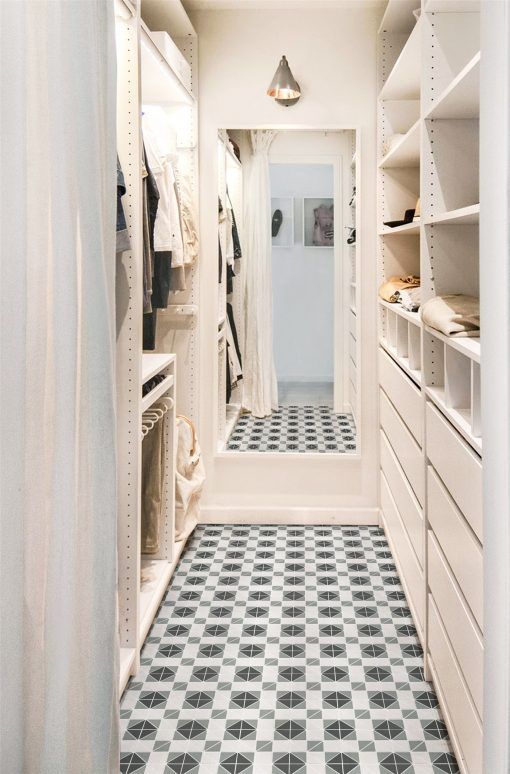 Large Walk In Closet With Tile Floor, Also Including Many Shelves