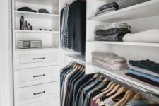 a small Nordic closet with open shelves, holders for clothes hangers and some built-in drawers is a cool idea