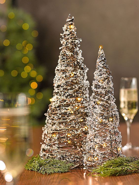 crystal wire and lights shaped as cones are a cool and glam alternative to usual tabletop Christmas trees