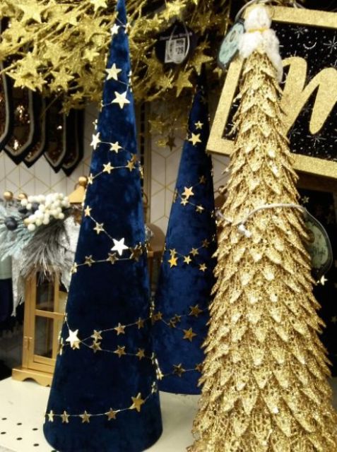 navy and gold cone Christmas trees made with sequins and gold stars are amazing for stylish and glam Christmas decor