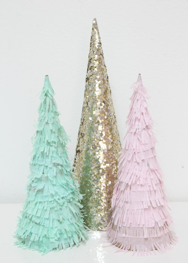 pink and green paper fringe Christmas trees and a gold sequin one will be a nice decor idea for styling a pastel Christmas space