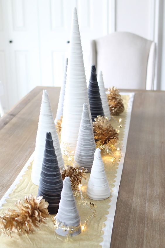 white, grey and graphite grey velvet cord cone Christmas trees, bleached pinecones and lights are great for holidays