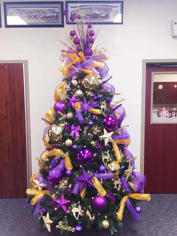 your Christmas tree will look great when you opt for gold and purple ornaments together, these two royal colors complement each other