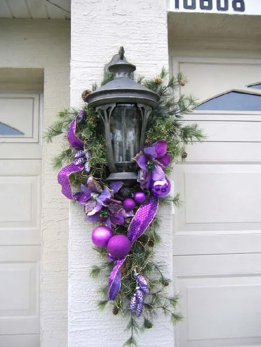 your outdoor lights will look great with silver purple Christmas decorations, use ribbon and balls with your greenery for a great look
