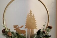 02 a beautiful embroidery hoop Christmas wreath of evergreens, pinecones, plywood trees and a moose plus a ribbon bow