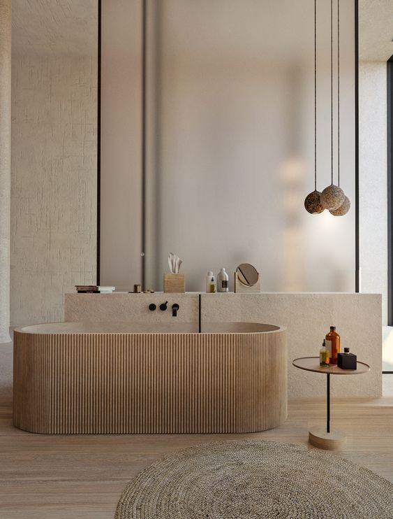 a neutral Japandi bathroom with natural stone, wood, a tub clad with wood, pendant lamps and a side table