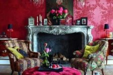 07 a lovely magenta vintage-inspired living room with a vintage fireplace, chic printed chairs and a hot pink ottoman, vintage artworks