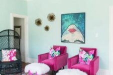 21 a bold and whimsical living room with a patterned ceiling, magenta chairs and stools, a bold printed artwork and a bold printed rug